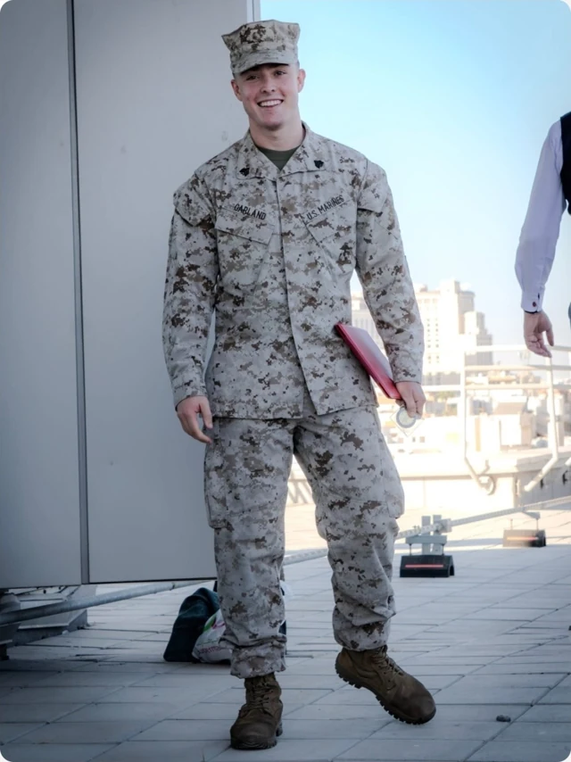 Full-length outdoor portrait in military uniform